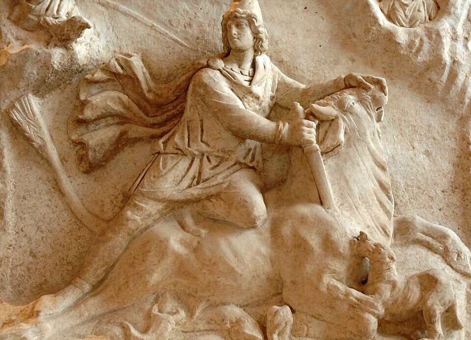 A detailed depiction of Mithras slaying the sacred bull inside a dimly lit mithraeum, with torches illuminating ancient stone walls and cosmic symbols.